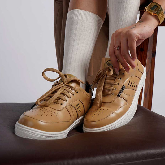 Fairmont beige sneakers with intricate minimalist design.
