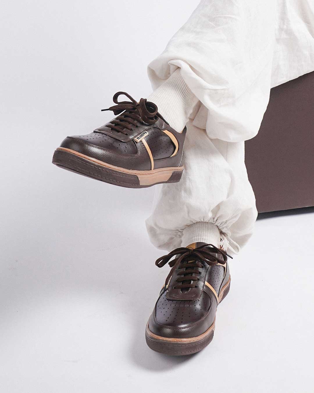 Bel-Air brown iconic low-top sneakers with flat landing for comfort.