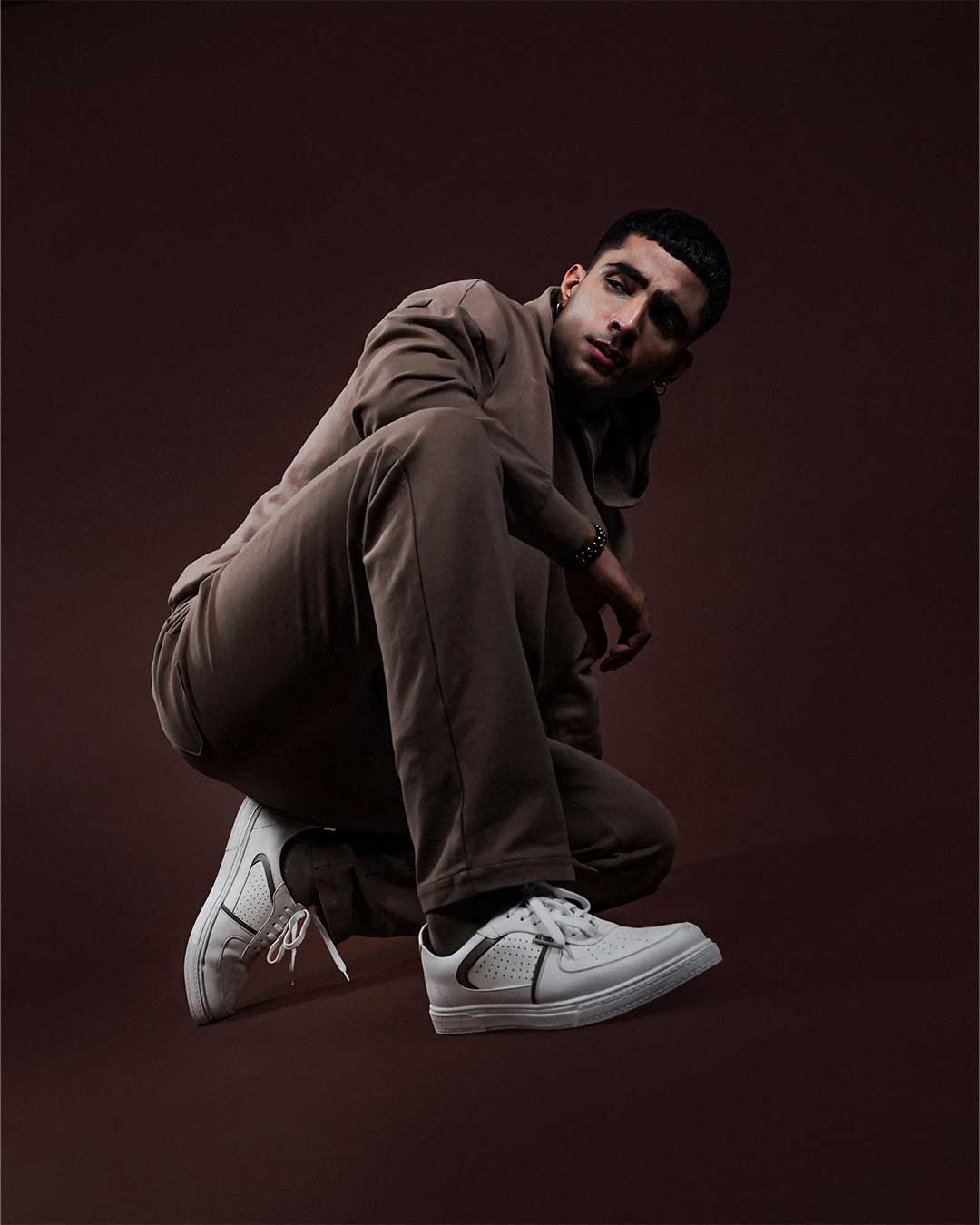 Bel-Air white low-top sneakers with PU leather and padded collars.