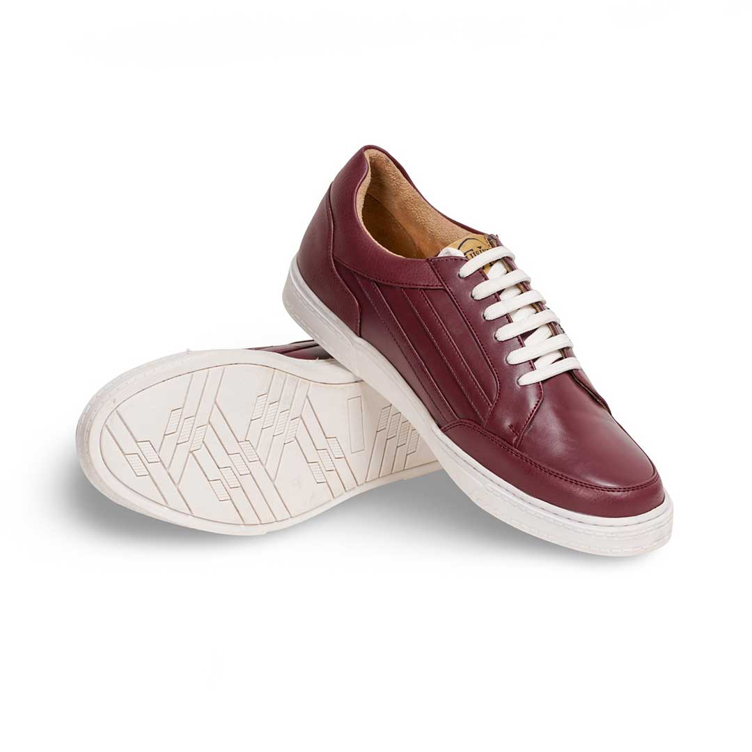 Mayfair magenta sneakers with flat landing and latex insoles for comfort.