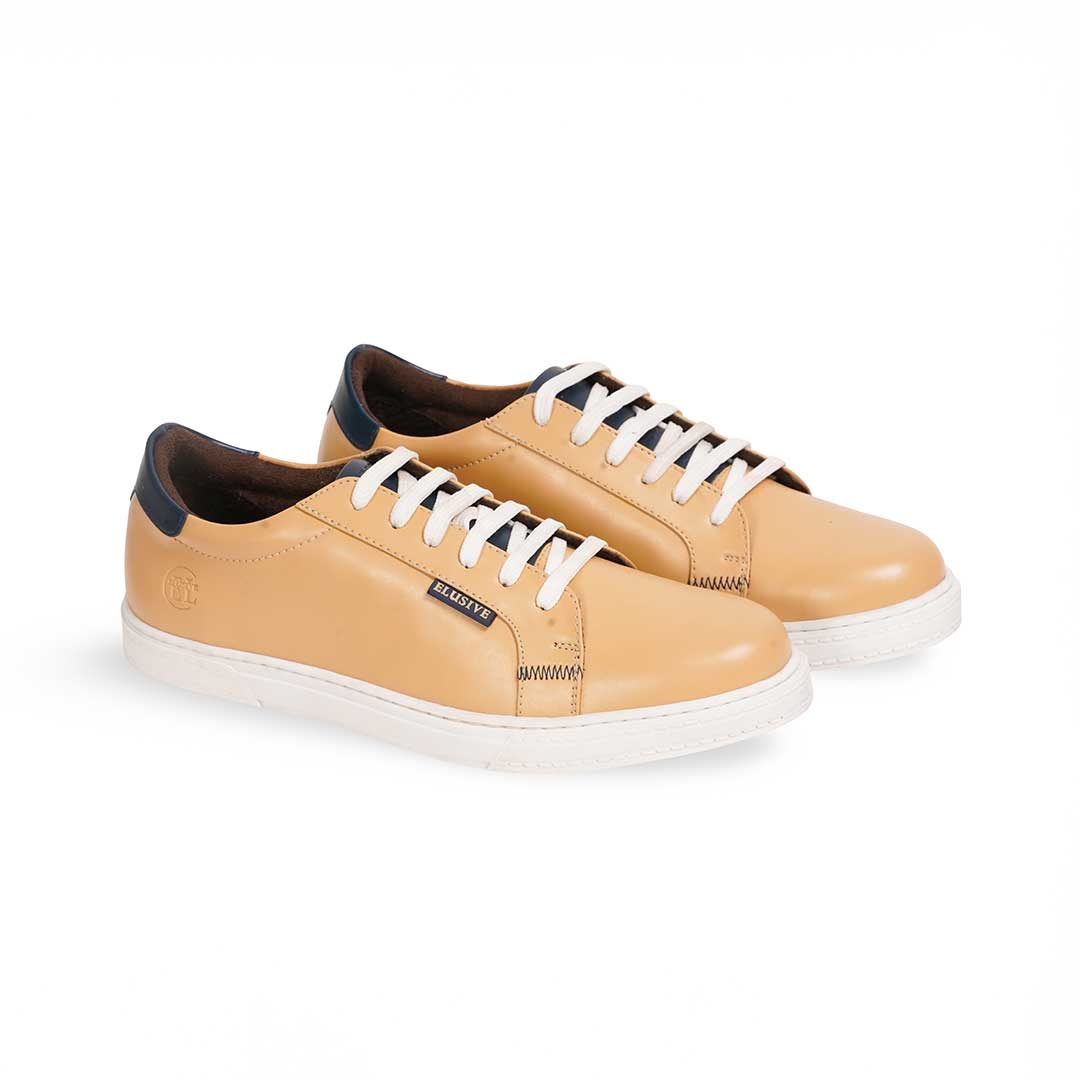 Minimalist sneakers featuring imported PU leather and signature 6-lace closure.