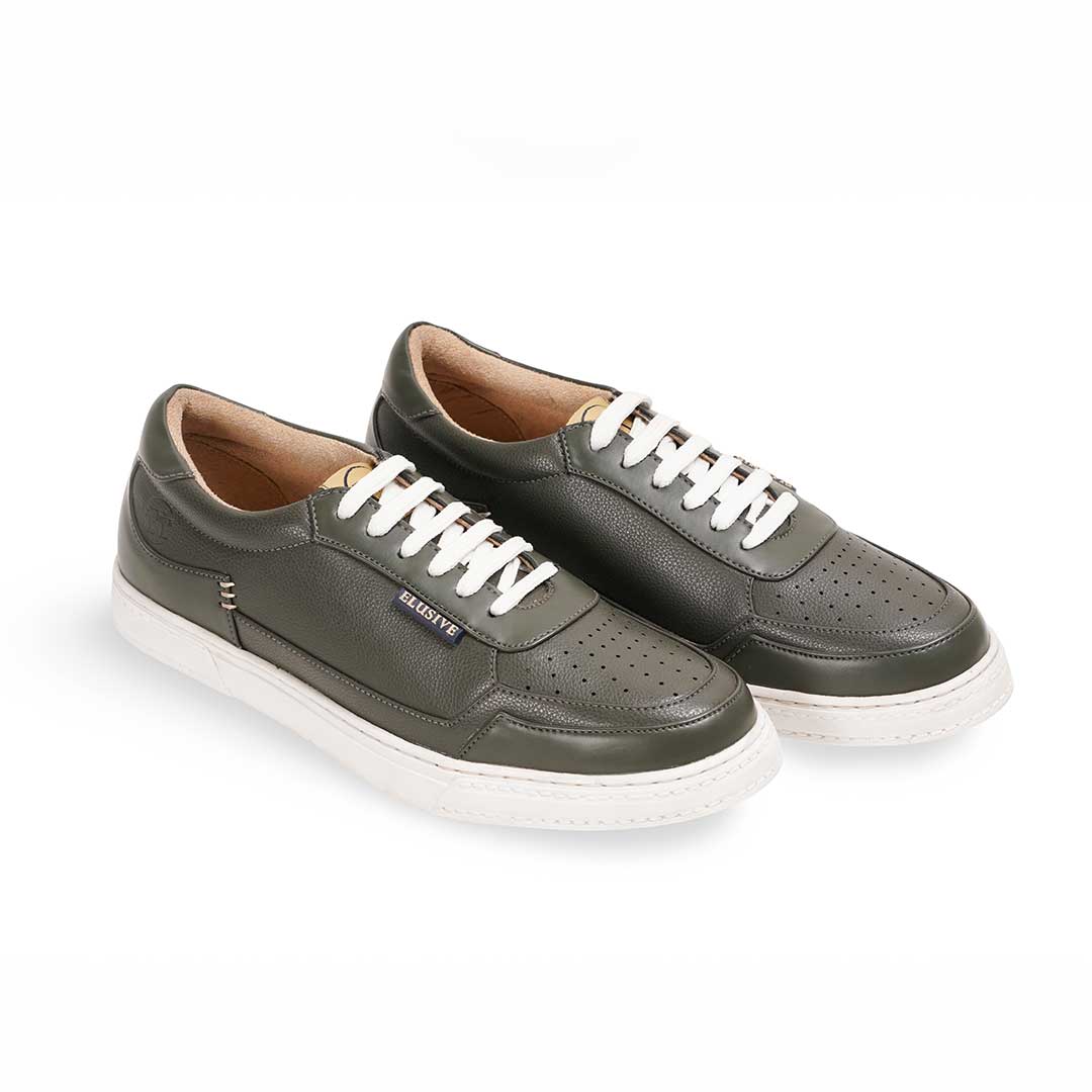 Raphael's olive low-top sneakers inspired by Italian craftsmanship.