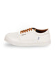 Raphael's white sneakers featuring timeless elegance and padded collars.