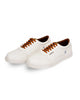 Raphael's white sneakers featuring timeless elegance and padded collars.