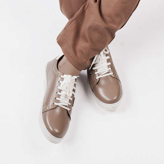 The Slate Standard low-top sneakers in versatile grey with a minimalist design.
